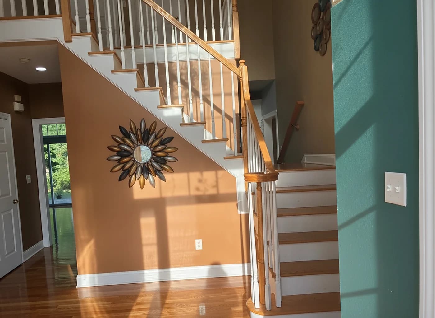 Refinished hardwood staircase and railings in a Fairfield County home