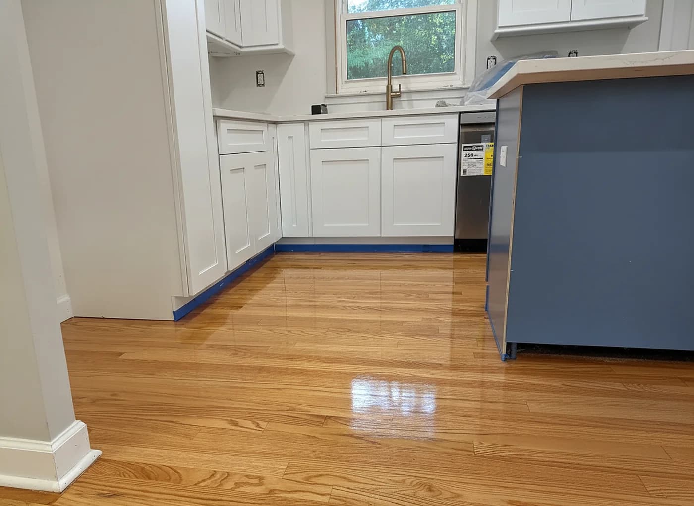 New hardwood floor in a bright modern kitchen in Fairfield County, CT